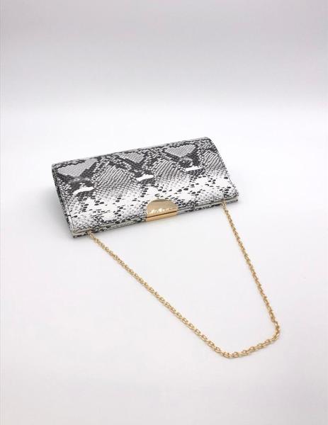 Bolso serpiente blanco top y negro